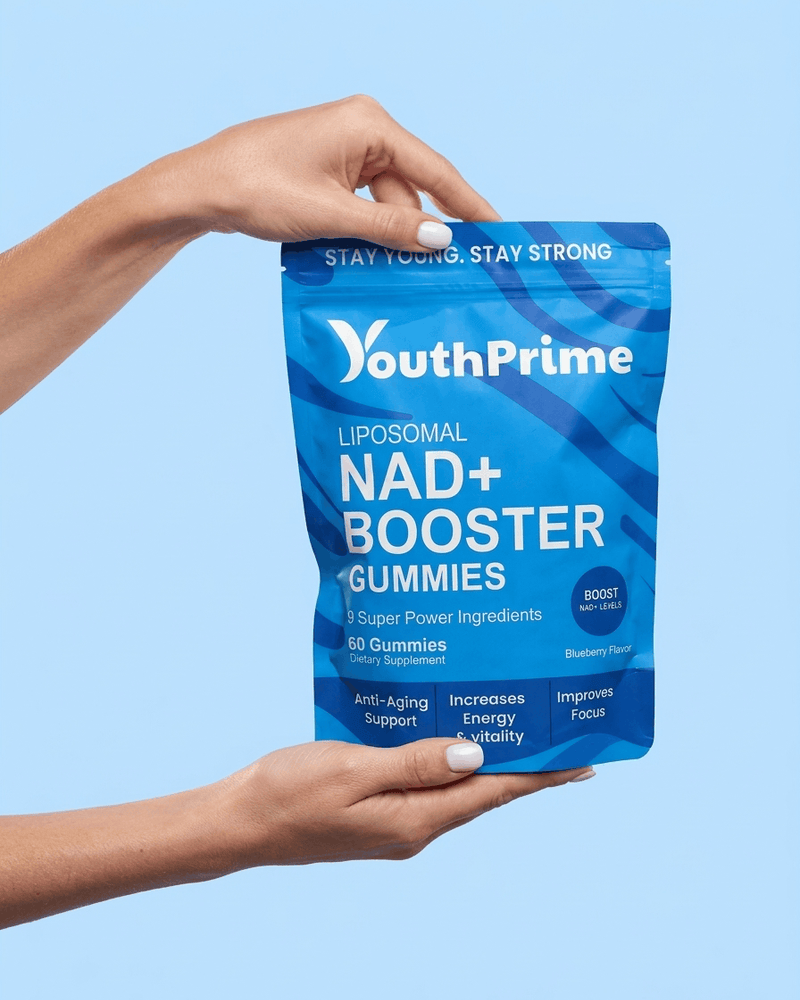 Two hands hold up the blue YouthPrime NAD+ Booster Gummies pouch on a light blue background